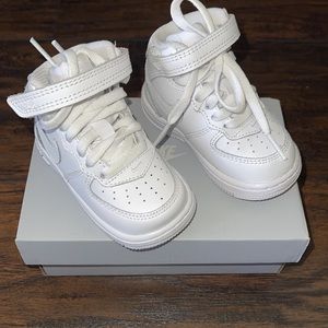 All white Nikes Air Force 1’s size 4c